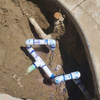 New sewer line installed in an open excavation