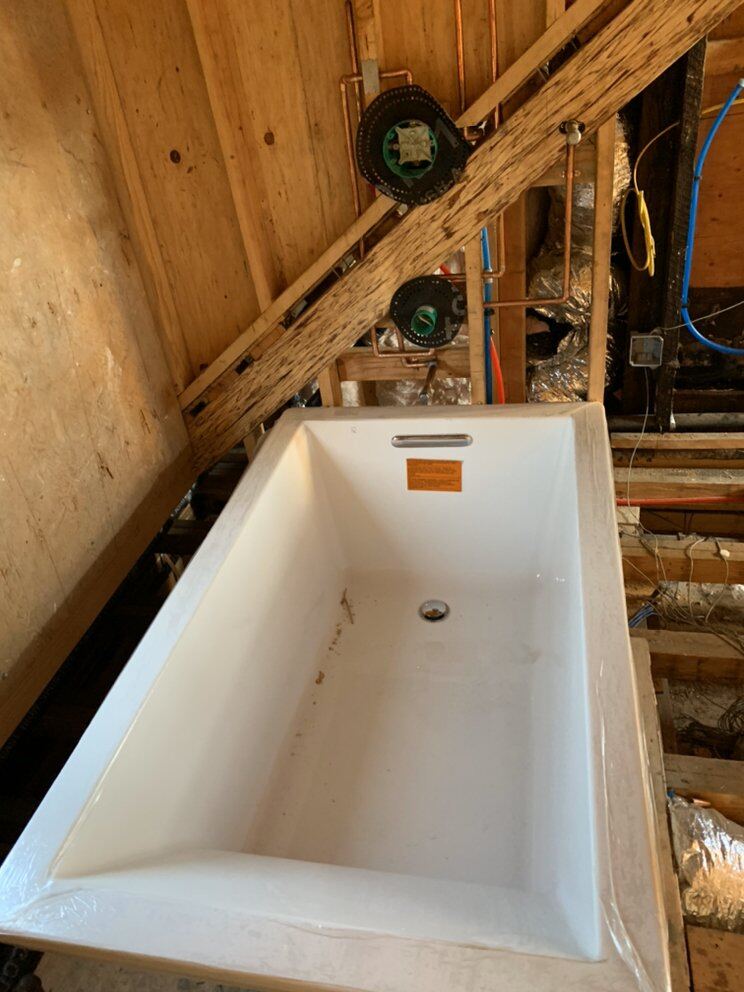 Original tub valve and spout before replacement